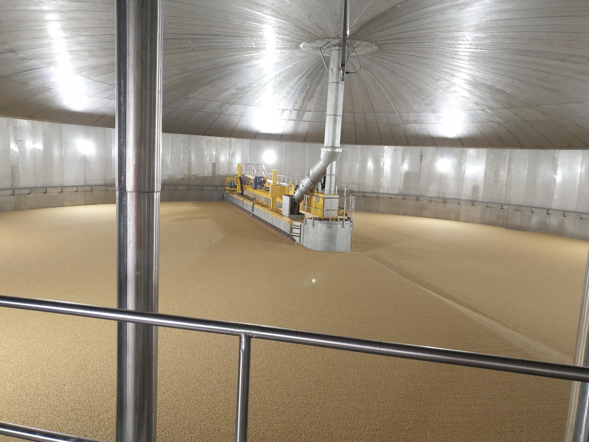 Germination vessel at Inverness with the turner machine over the barley bed