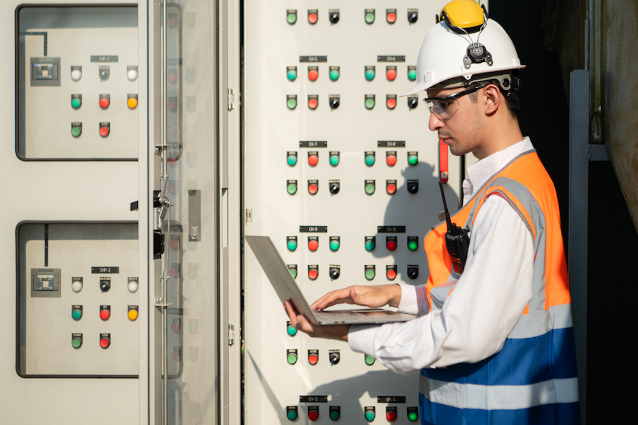 PLC control panel design for industrial machinery, with organised wiring and automation components.